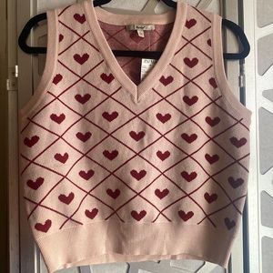 Pink and red vest. New with tag.